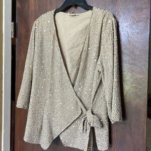 Vintage silver beaded and sequin tan colored jacket with bowtie.